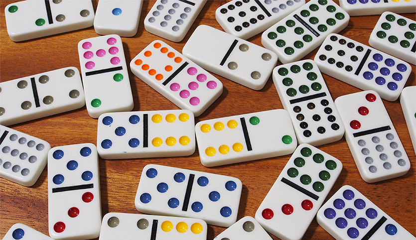 Domino game pieces on table