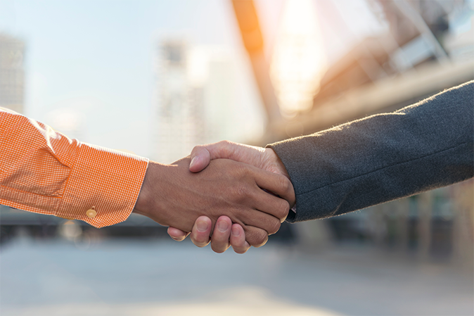 Lawyer partnership Businessman handshake together Notary lawfirm. Two Men Trust honesty business customer handshake promise respect partner. Diversity solidarity team Partner hands together teamwork