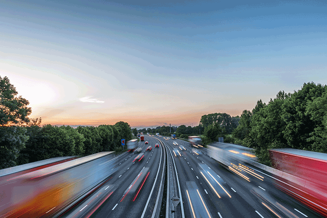 Heavy traffic moving fast on a highway