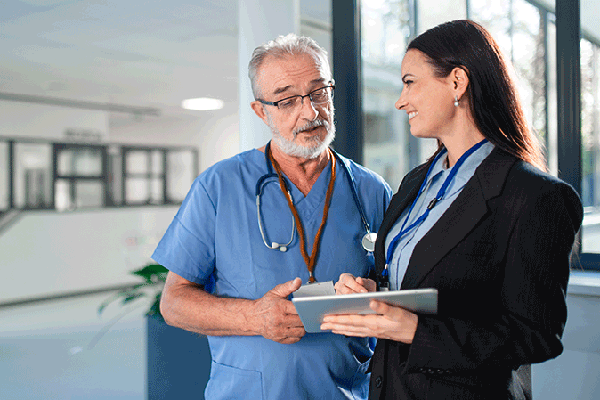 Lawyer holding a tablet consulting with a doctor