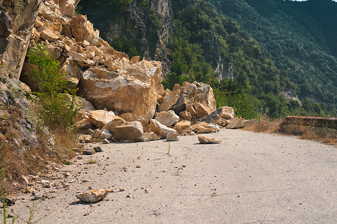 Rock landslide blocking a road