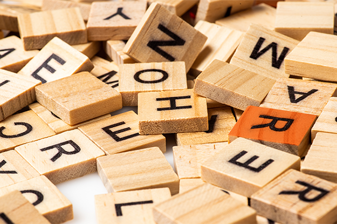 Scrabble game pieces on table