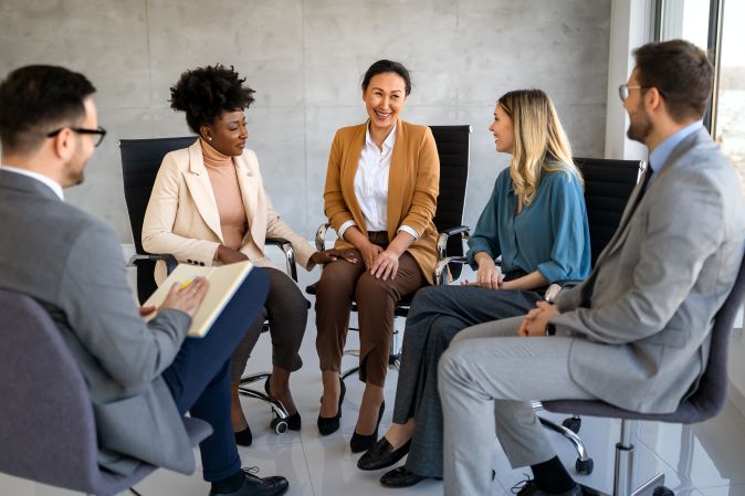 inclusive employees having a company meeting