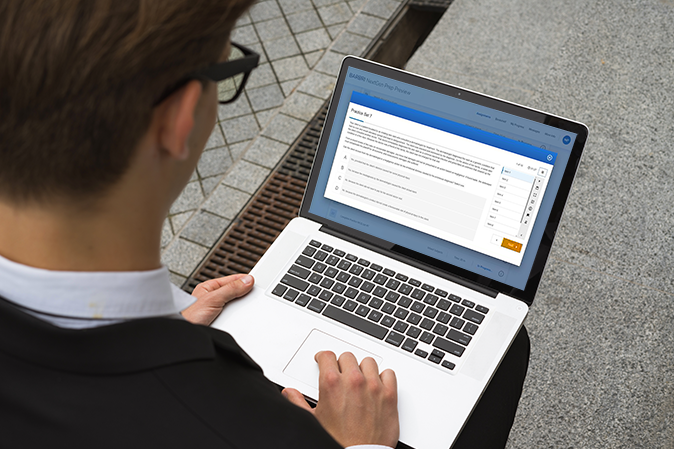 A young professional on a laptop with the NextGen Bar Prep course